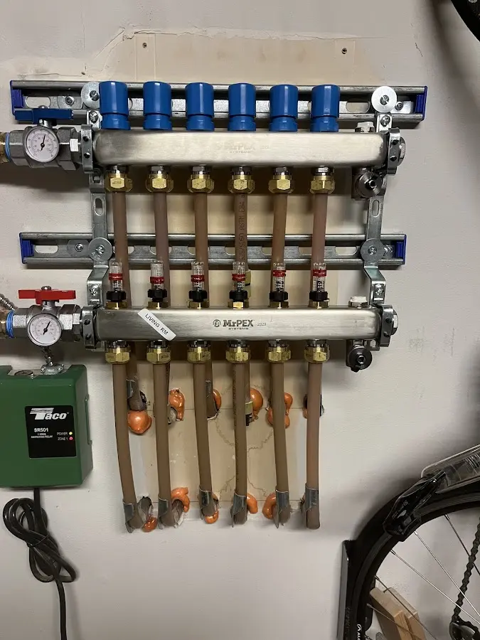 Plumber performing Water Heater Repair at a residential property in Georgia